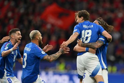 DORTMUND, GERMANY - JUNE 15: Nicolo Barella of Italy (hidden) celebrates scoring his team's second goal with teammates during the UEFA EURO 2024 group stage match between Italy and Albania at Football Stadium Dortmund on June 15, 2024 in Dortmund, Germany. (Photo by Claudio Villa/Getty Images for FIGC)