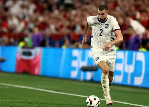 epa11437661 Strahinja Pavlovic of Serbia in action during the UEFA EURO 2024 Group C soccer match between Denmark and Serbia, in Munich, Germany, 25 June 2024. EPA-EFE/ANNA SZILAGYI