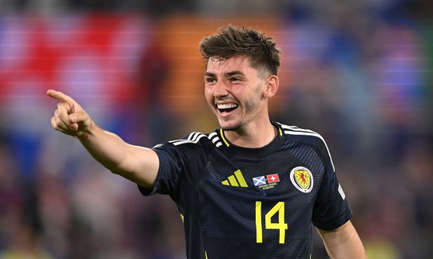 COLOGNE, GERMANY - JUNE 19: Scotland player Billy Gilmour points and smiles after the UEFA EURO 2024 group stage match between Scotland and Switzerland at Cologne Stadium on June 19, 2024 in Cologne, Germany. (Photo by Stu Forster/Getty Images)