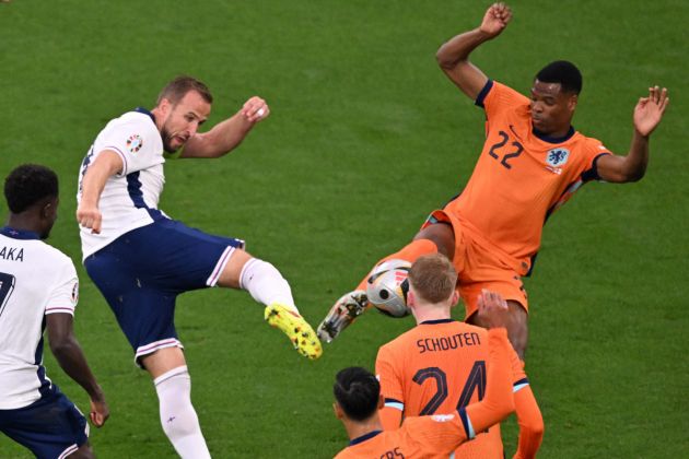 TOPSHOT - England's forward #09 Harry Kane fights for the ball with Netherlands' defender #22 Denzel Dumfries during the UEFA Euro 2024 semi-final football match between the Netherlands and England at the BVB Stadion in Dortmund on July 10, 2024. (Photo by Kirill KUDRYAVTSEV / AFP) (Photo by KIRILL KUDRYAVTSEV/AFP via Getty Images)