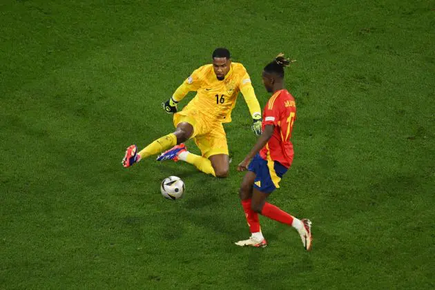 MUNICH, GERMANY - JULY 09: Nico Williams of Spain is challenged by Mike Maignan of France during the UEFA EURO 2024 Semi-Final match between Spain and France at Munich Football Arena on July 09, 2024 in Munich, Germany. (Photo by Matthias Hangst/Getty Images)