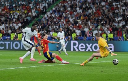 BERLIN, GERMANY - JULY 14: Mikel Oyarzabal of Spain scores his team's second goal as Jordan Pickford of England fails to a make a save during the UEFA EURO 2024 final match between Spain and England at Olympiastadion on July 14, 2024 in Berlin, Germany. (Photo by Dan Mullan/Getty Images)