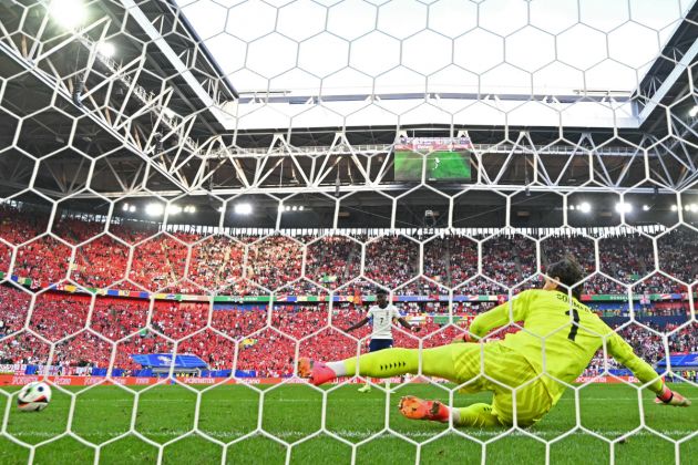 Switzerland's goalkeeper #01 Yann Sommer concedes a penalty goal by England's forward #07 Bukayo Saka during the UEFA Euro 2024 quarter-final football match between England and Switzerland at the Duesseldorf Arena in Duesseldorf on July 6, 2024. (Photo by Ina FASSBENDER / AFP) (Photo by INA FASSBENDER/AFP via Getty Images)