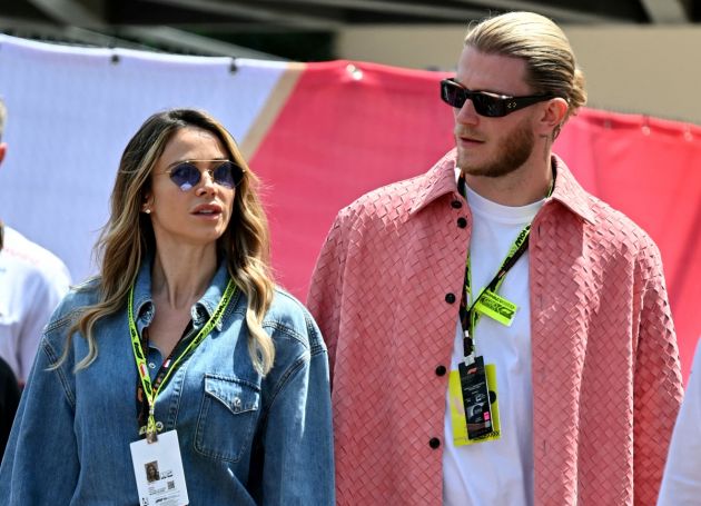 Italian radio and tv host Diletta Leotta (L) and boyfriend Newcastle United's German goalkeeper Loris Karius (R) walk in the paddock ahead of the Formula One Monaco Grand Prix on May 26, 2024 at the Circuit de Monaco. (Photo by ANDREJ ISAKOVIC / AFP) (Photo by ANDREJ ISAKOVIC/AFP via Getty Images)