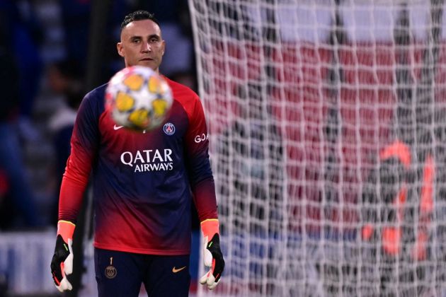 Paris Saint-Germain's Costa Rican Goalkeeper #01 Keylor Navas watches the ball as he warms up ahead of the UEFA Champions League quarter final first leg football match between Paris Saint-Germain (PSG) and FC Barcelona at the Parc des Princes stadium in Paris on April 10, 2024. (Photo by Miguel MEDINA / AFP) (Photo by MIGUEL MEDINA/AFP via Getty Images)