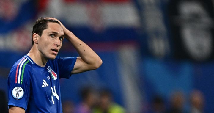 Italy's forward #14 Federico Chiesa reacts during the UEFA Euro 2024 Group B football match between Croatia and Italy at the Leipzig Stadium in Leipzig on June 24, 2024. (Photo by GABRIEL BOUYS / AFP) (Photo by GABRIEL BOUYS/AFP via Getty Images)