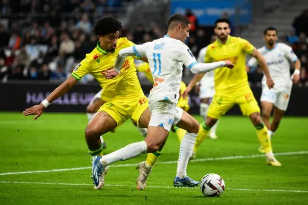 Marseille's Moroccan French midfielder #11 Amine Harit fights for the ball with Nantes' French defender #44 Inter target Nathan Zeze (L) during the French L1 football match between Olympique Marseille (OM) and FC Nantes at Stade Velodrome in Marseille, southern France on March 10, 2024. (Photo by CHRISTOPHE SIMON / AFP) (Photo by CHRISTOPHE SIMON/AFP via Getty Images)