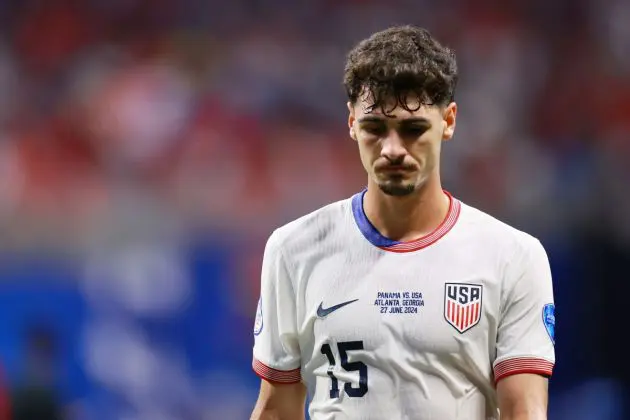 ATLANTA, GEORGIA - JUNE 27: Johnny Cardoso of United States looks dejected after losing the CONMEBOL Copa America USA 2024 Group C match between Panama and United States at Mercedes-Benz Stadium on June 27, 2024 in Atlanta, Georgia. (Photo by Hector Vivas/Getty Images)