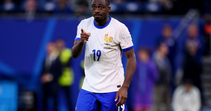 HAMBURG, GERMANY - JULY 05: Youssouf Fofana of France celebrates scoring the team's second penalty in the penalty shoot out during the UEFA EURO 2024 quarter-final match between Portugal and France at Volksparkstadion on July 05, 2024 in Hamburg, Germany. (Photo by Justin Setterfield/Getty Images) (Milan links)