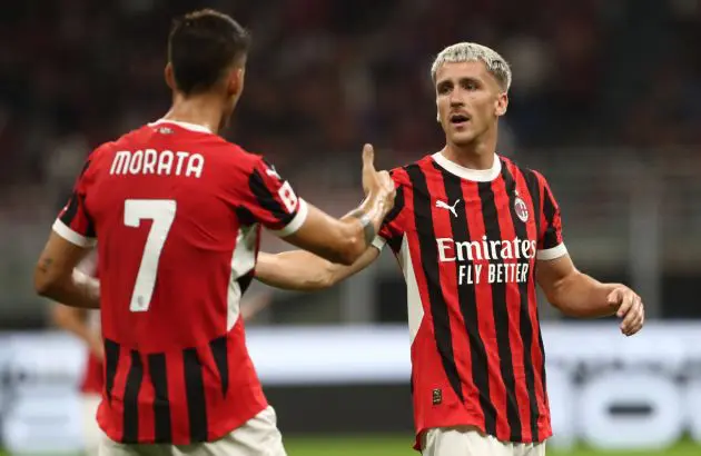 MILAN, ITALY - AUGUST 13: Alexis Saelemaekers of AC Milan celebrates with his team-mate Alvaro Morata after scoring the opening goal during the Trofeo Berlusconi match between AC Milan and AC Monza on August 13, 2024 in Milan, Italy. (Photo by Marco Luzzani/Getty Images)