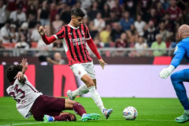 AC Milan's Spanish forward #07 Alvaro Morata (C) attempts to shoot the ball past Torino's Equatorial Guinea defender #23 Saul Basilio Coco-Bassey Oubina during the Italian Serie A football match between AC Milan and Torino at the San Siro Stadium in Milan, on August 17, 2024. (Photo by Piero CRUCIATTI / AFP) (Photo by PIERO CRUCIATTI/AFP via Getty Images)