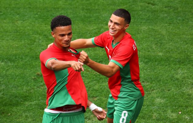 NICE, FRANCE - JULY 30: Amir Richardson #18 of Team Morocco celebrates scoring his team's first goal with teammate Bilal El Khannouss during the Men's group B match between Morocco and Iraq during the Olympic Games Paris 2024 at Stade de Nice on July 30, 2024 in Nice, France. (Photo by Marc Atkins/Getty Images)