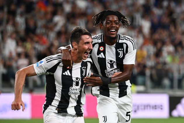 Juventus' Italian defender #27 Andrea Cambiaso (L) celebrates scoring his team's third goal with Juventus' Belgian forward #51 Samuel Mbangula during the Italian Serie A football match between Juventus and Como at The Allianz Stadium in Turin on August 19, 2024. (Photo by Isabella BONOTTO / AFP) (Photo by ISABELLA BONOTTO/AFP via Getty Images)