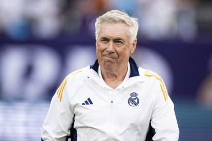 EAST RUTHERFORD, NEW JERSEY - AUGUST 3: Carlo Ancelotti, head coach of Real Madrid walks onto the pitch before in the pre-season friendly match against the FC Barcelona at MetLife Stadium on August 3, 2024 in East Rutherford, New Jersey. (Photo by Ira L. Black/Getty Images)