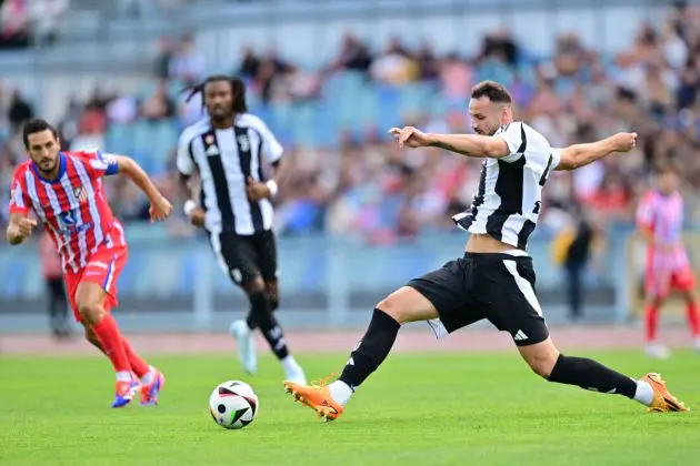 Juventus' Italian defender Frederico Gatti (R) controls the ball during the pre-season friendly football club match between Spain's Atlético Madrid and Italy's Juventus at Ullevi stadium n Gothenburg, Sweden, on August 11, 2024. (Photo by Bjorn LARSSON ROSVALL / TT NEWS AGENCY / AFP) / Sweden OUT (Photo by BJORN LARSSON ROSVALL/TT NEWS AGENCY/AFP via Getty Images)