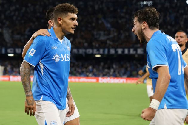 NAPLES, ITALY - AUGUST 25: Giovanni Di Lorenzo and Khvicha Kvaratskhelia of SSC Napoli celebrate their side's first goal scored by Giovanni Di Lorenzo after scoring his side's first goal during the Serie match between Napoli and Bologna at Stadio Diego Armando Maradona on August 25, 2024 in Naples, Italy. (Photo by Francesco Pecoraro/Getty Images)