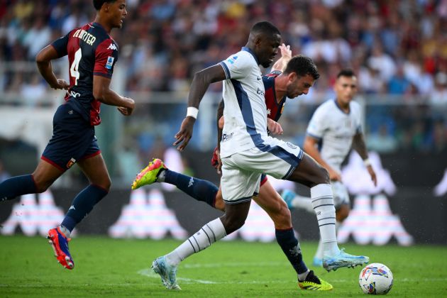 Inter Milan's French forward #09 Marcus Thuram (C) fights for the ball with Genoa's Italian defender #13 Mattia Bani (2R) during the Italian Serie A football match between Genoa and Inter Milan at the Luigi Ferraris Stadium in Genoa, on August 17, 2024. (Photo by MARCO BERTORELLO / AFP) (Photo by MARCO BERTORELLO/AFP via Getty Images)