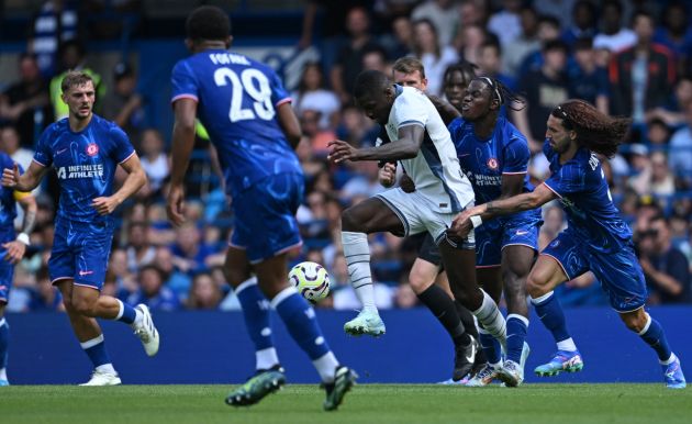 Inter Milan's French forward #09 Marcus Thuram is fouled during the pre-season friendly football match between Chelsea and Inter Milan at the Stamford Bridge stadium in London on August 11, 2024. (Photo by JUSTIN TALLIS / AFP) (Photo by JUSTIN TALLIS/AFP via Getty Images)