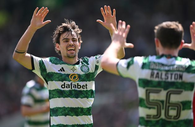 GLASGOW, SCOTLAND - MAY 18: Matt O'Riley (l) of Celtic celebrates the winning Celtic goal with team mate Anthony Ralston during the Cinch Scottish Premiership match between Celtic FC v St Mirren at Celtic Park Stadium on May 18, 2024 in Glasgow, Scotland. (Photo by Stu Forster/Getty Images)