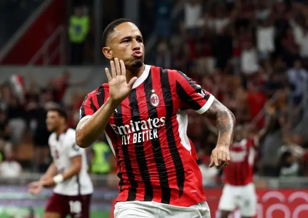 MILAN, ITALY - AUGUST 17: Noah Okafor of AC Milan celebrates scoring his team's second goal during the Serie A match between AC Milan and Torino at Stadio Giuseppe Meazza on August 17, 2024 in Milan, Italy. (Photo by Marco Luzzani/Getty Images)