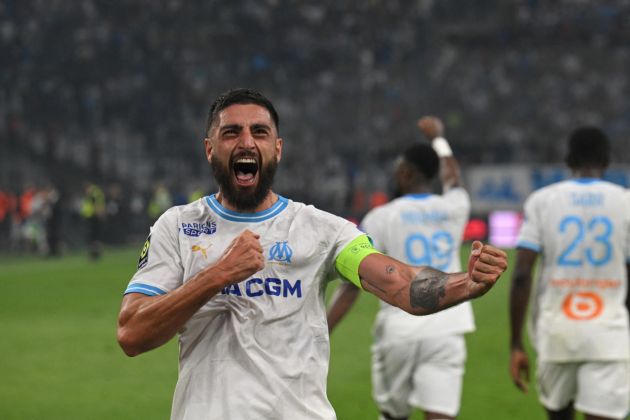 Marseille's French defender #04 Samuel Gigot celebrates after scoring his team's second goal during the French L1 football match between Olympique Marseille (OM) and FC Lorient at the Stade Velodrome in Marseille, southern France, on May 12, 2024. (Photo by Nicolas TUCAT / AFP) (Photo by NICOLAS TUCAT/AFP via Getty Images)