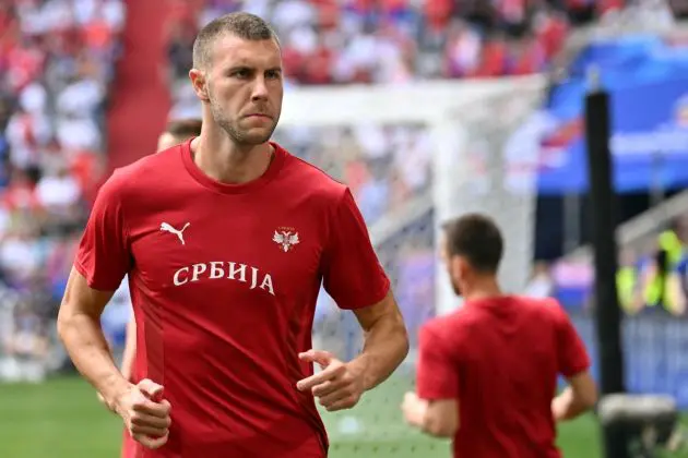 Serbia's defender #02 Strahinja Pavlovic warms up prior to the UEFA Euro 2024 Group C football match between Slovenia and Serbia at the Munich Football Arena in Munich on June 20, 2024. (Photo by MIGUEL MEDINA / AFP) (Photo by MIGUEL MEDINA/AFP via Getty Images)