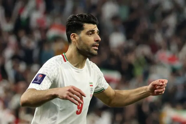 AL RAYYAN, QATAR - JANUARY 23: Mehdi Taremi of Iran celebrates scoring his team's second goal during the AFC Asian Cup Group C match between Iran and United Arab Emirates at Education City Stadium on January 23, 2024 in Al Rayyan, Qatar. (Photo by Lintao Zhang/Getty Images)