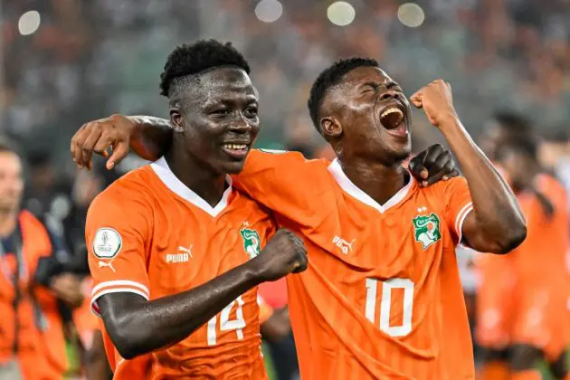 TOPSHOT - Ivory Coast's forward #14 Oumar Diakite (L) and Ivory Coast's forward #10 Karim Konate celebrate after winning at the end of the Africa Cup of Nations (CAN) 2024 final football match between Ivory Coast and Nigeria at Alassane Ouattara Olympic Stadium in Ebimpe, Abidjan on February 11, 2024. (Photo by Sia KAMBOU / AFP) (Photo by SIA KAMBOU/AFP via Getty Images)