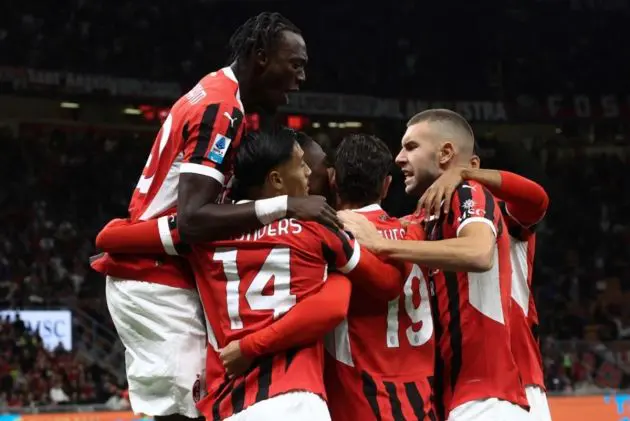 AC Milan's players celebrate a goal scored by teammate Theo Hernandez during the Italian Serie A soccer match between AC Milan and Venezia FC, in Milan, northern Italy, 14 September 2024. EPA-EFE/ROBERTO BREGANI