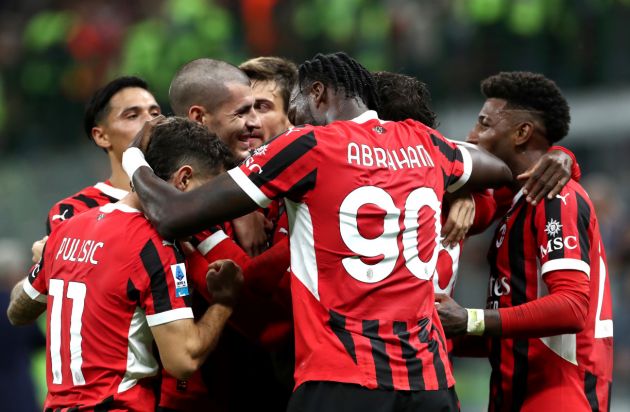 MILAN, ITALY - SEPTEMBER 27: Theo Hernandez of AC Milan celebrates with team mates after scoring his team's second goal during the Serie A match between AC Milan and Lecce at Stadio Giuseppe Meazza on September 27, 2024 in Milan, Italy. (Photo by Marco Luzzani/Getty Images)