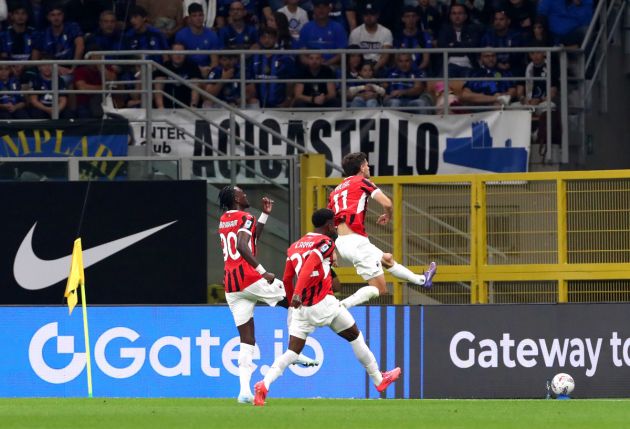 MILAN, ITALY - SEPTEMBER 22: Christian Pulisic of AC Milan celebrates scoring his team's first goal during the Serie A match between FC Internazionale and AC Milan at Stadio Giuseppe Meazza on September 22, 2024 in Milan, Italy. (Photo by Marco Luzzani/Getty Images)