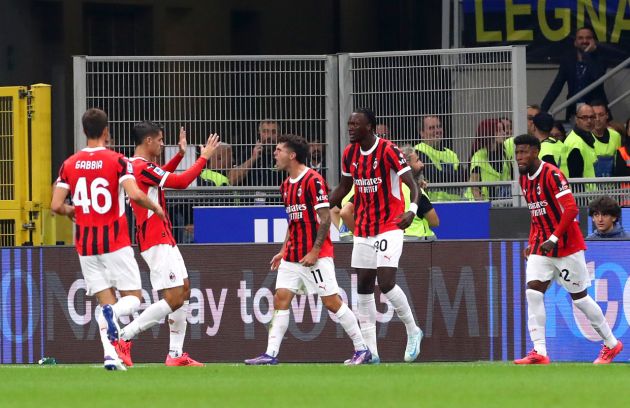 MILAN, ITALY - SEPTEMBER 22: Christian Pulisic of AC Milan celebrates scoring his team's first goal with teammates during the Serie A match between FC Internazionale and AC Milan at Stadio Giuseppe Meazza on September 22, 2024 in Milan, Italy. (Photo by Marco Luzzani/Getty Images)