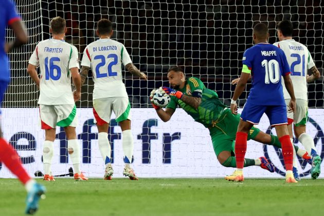 Italy's goalkeeper #01 Gianluigi Donnarumma makes a save during the UEFA Nations League Group A2 football match between France and Italy at the Parc des Princes in Paris on September 6, 2024. (Photo by Franck FIFE / AFP) (Photo by FRANCK FIFE/AFP via Getty Images)