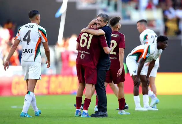 ROME, ITALY - SEPTEMBER 29: Niccolo Pisilli interacts with Ivan Juric, Head Coach of AS Roma, after the Serie A match between AS Roma and Venezia at Stadio Olimpico on September 29, 2024 in Rome, Italy. (Photo by Paolo Bruno/Getty Images)