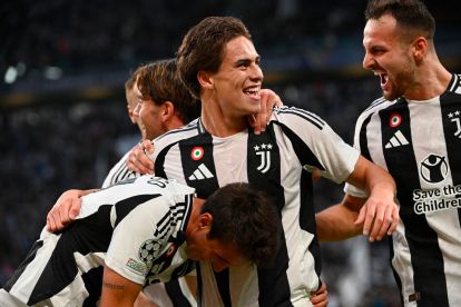 Juventus' Turkish forward #10 Kenan Yildiz (C) celebrates scoring his team's first goal during the UEFA Champions League 1st round day 1 football match between Juventus FC and PSV Eindhoven, at the Juventus Stadium in Turin on September 17, 2024. (Photo by Isabella BONOTTO / AFP) (Photo by ISABELLA BONOTTO/AFP via Getty Images)