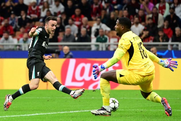 Liverpool's Portuguese midfielder #20 Diogo Jota misses the target in front of AC Milan's French goalkeeper #16 Mike Maignan during the UEFA Champions League 1st round day 1 football match between AC Milan and Liverpool FC at the San Siro stadium in Milan on September 17, 2024. (Photo by PIERO CRUCIATTI / AFP) (Photo by PIERO CRUCIATTI/AFP via Getty Images)