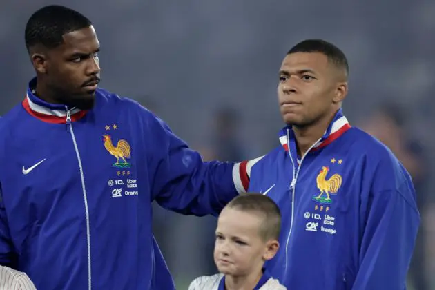 France's goalkeeper #16 Mike Maignan (L) and France's forward #10 Kylian Mbappe react prior to the UEFA Nations League Group A2 football match between France and Italy at the Parc des Princes in Paris on September 6, 2024. (Photo by STEPHANE DE SAKUTIN / AFP) (Photo by STEPHANE DE SAKUTIN/AFP via Getty Images)