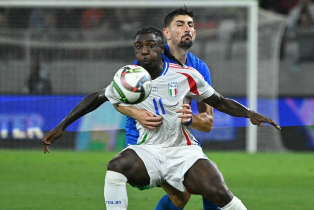 Italy's forward #11 Moise Kean and Israel's defender #05 Idan Nachmias vie for the ball during the UEFA Nations League, League A, Group A2 football match Israel vs Italy at the Bozsik Arena in Budapest, Hungary, on September 9, 2024. (Photo by Attila KISBENEDEK / AFP) (Photo by ATTILA KISBENEDEK/AFP via Getty Images)