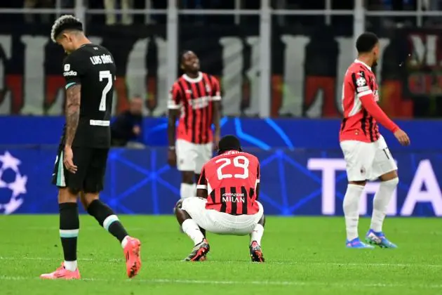 Milan players dejected during 3-1 loss at home to Liverpool in the UEFA Champions League.