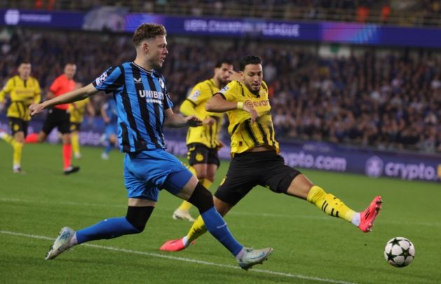 Milan-linked Andreas Skov Olsen (L) of Club Brugge in action against Ramy Bensebaini of Borussia Dortmund during the UEFA Champions League match between Club Brugge and Borussia Dortmund in Bruges, Belgium, 18 September 2024. EPA-EFE/OLIVIER MATTHYS