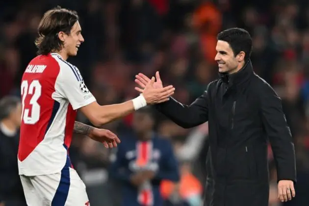 Arsenal manager Mikel Arteta (R) shakes hands with player Riccardo Calafiori after the UEFA Champions League match between Arsenal and Paris Saint-Germain in London, Britain, 01 October 2024. Arsenal won 2-0. EPA-EFE/DANIEL HAMBURY