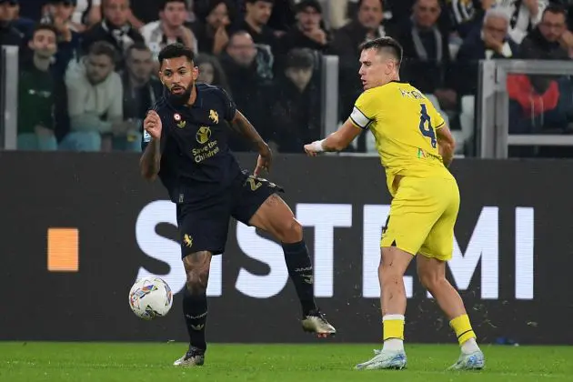 TURIN, ITALY - OCTOBER 19: Pat Allianz Stadiumric of SS Lazio compete for the ball with Douglas Luiz of Juventus during the Serie A match between Juventus and Lazio at Allianz Stadium on October 19, 2024 in Turin, Italy. (Photo by Marco Rosi - SS Lazio/Getty Images)