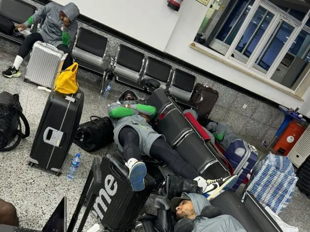 Nigeria players try to sleep after being left stranded in an airport in Libya for over 16 hours (picture: @WTroostEkong via X)