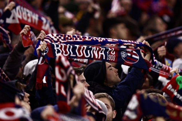 Bologna supporters raise their scarves (picture @bolognafc1909 via X)