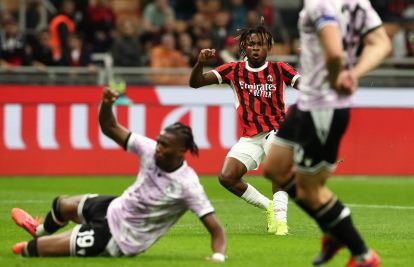 MILAN, ITALY - OCTOBER 19: Samuel Chukwueze of AC Milan scores the opening goal during the Serie A match between AC Milan and Udinese Calcio at Stadio Giuseppe Meazza on October 19, 2024 in Milan, Italy. (Photo by Marco Luzzani/Getty Images)