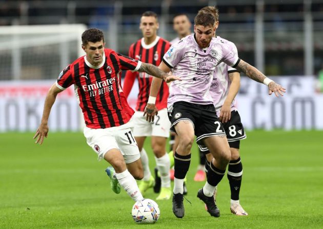 MILAN, ITALY - OCTOBER 19: Christian Pulisic of AC Milan competes for the ball with Iker Bravo of Udinese Calcio during the Serie A match between AC Milan and Udinese Calcio at Stadio Giuseppe Meazza on October 19, 2024 in Milan, Italy. (Photo by Marco Luzzani/Getty Images)