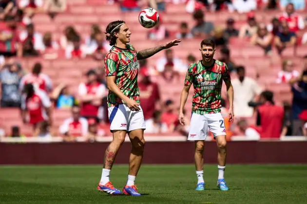 Calafiori and Jorginho warm up before an Arsenal game in the 2023-24 campaign (Getty)