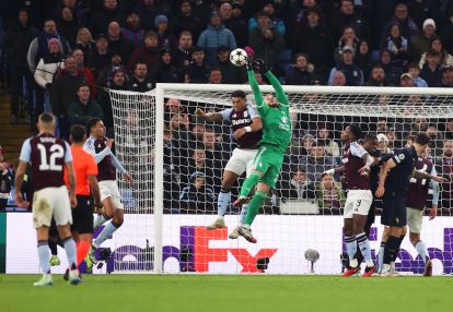 BIRMINGHAM, ENGLAND - NOVEMBER 27: Diego Carlos of Aston Villa fouls Michele Di Gregorio of Juventus, before Morgan Rogers of Aston Villa goes on to score a goal which is later ruled out following a VAR Review, during the UEFA Champions League 2024/25 League Phase MD5 match between Aston Villa FC and Juventus at Villa Park on November 27, 2024 in Birmingham, England. (Photo by Ryan Pierse/Getty Images)avl