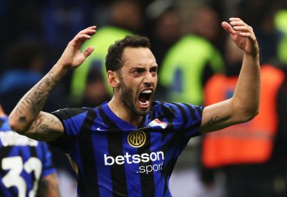 MILAN, ITALY - NOVEMBER 10: Hakan Calhanoglu of FC Internazionale celebrates scoring his team's first goal during the Serie A match between FC Internazionale and Napoli at Stadio Giuseppe Meazza on November 10, 2024 in Milan, Italy. (Photo by Marco Luzzani/Getty Images)