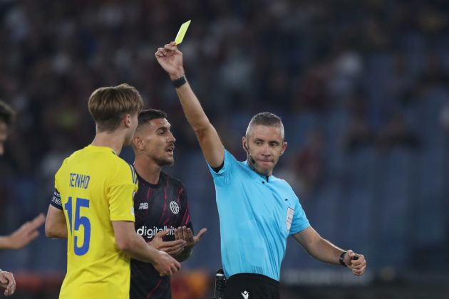 ROME, ITALY - SEPTEMBER 15: The referee Radu Petrescu shows the yellow card to Miro Tenho of HJK Helsinki during the UEFA Europa League group C match between AS Roma and HJK Helsinki at Stadio Olimpico on September 15, 2022 in Rome, Italy. (Photo by Paolo Bruno/Getty Images)